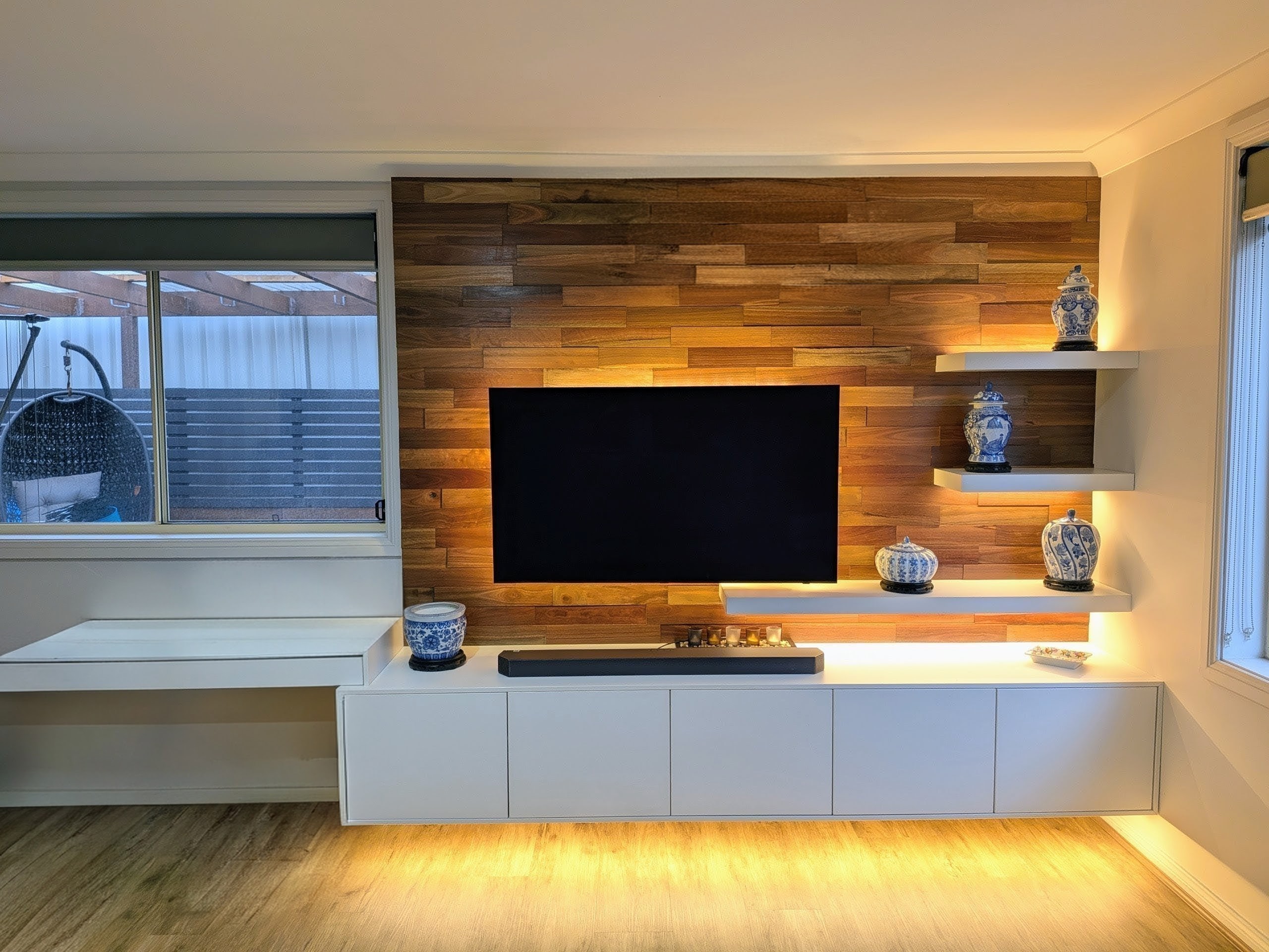 Rich Australian timber feature wall tones for TV wall area