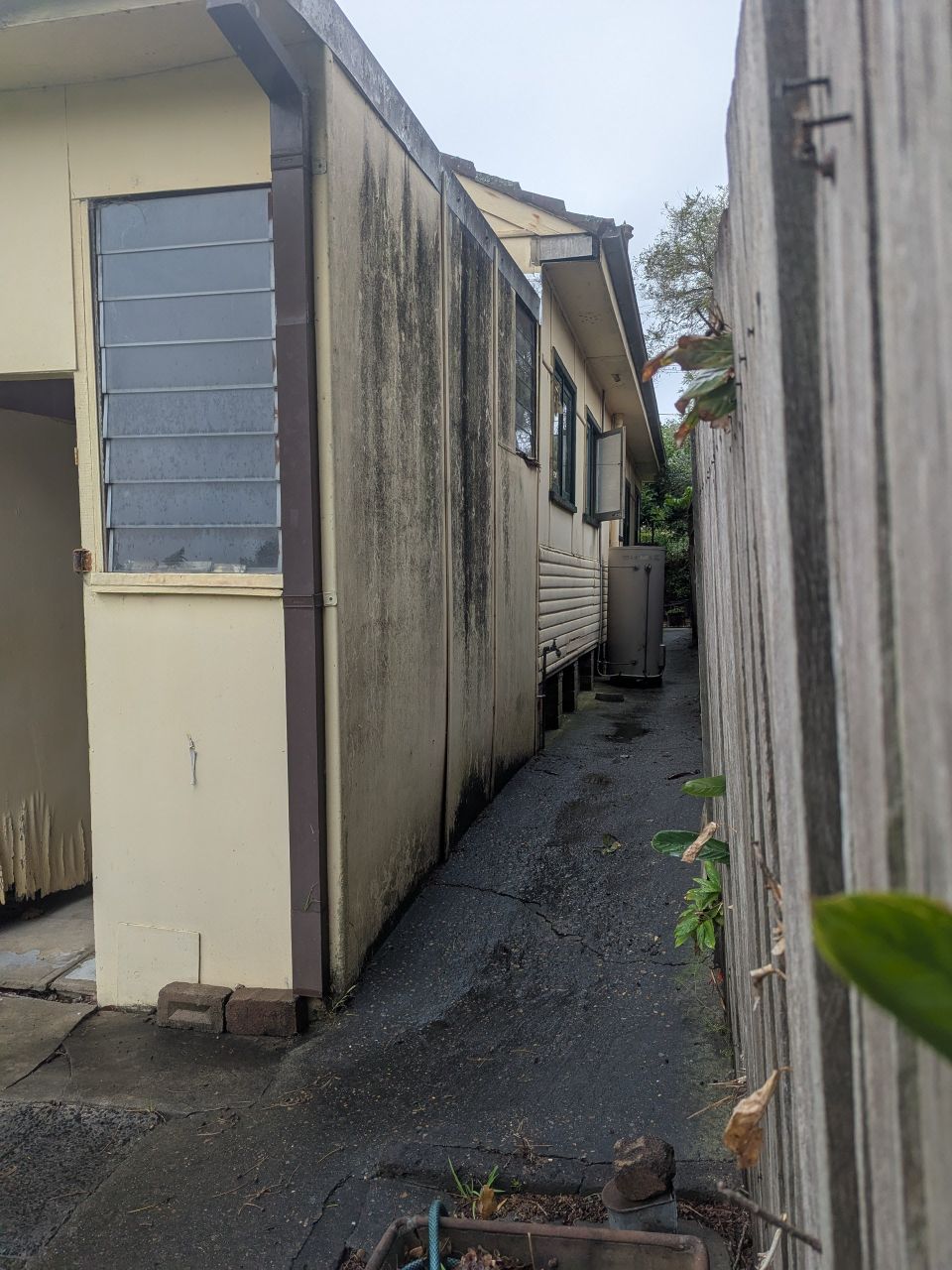 Before and after house cladding transformation in Wollongong