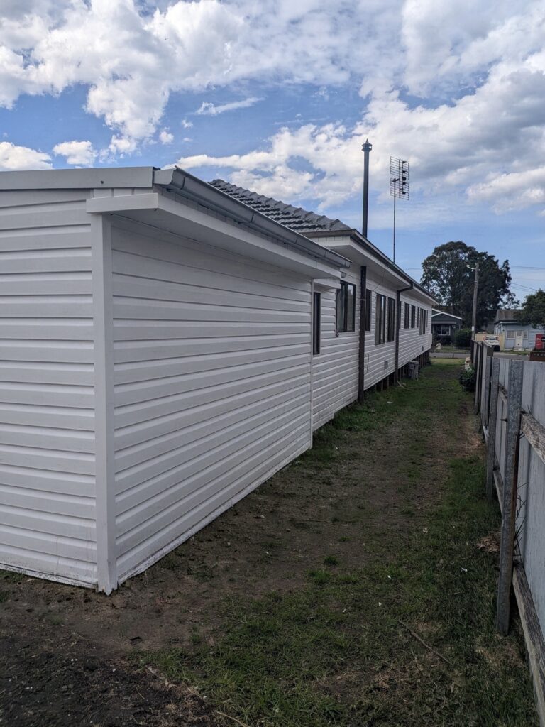 Modern exterior renovation using solid vinyl wall cladding in Wollongong NSW