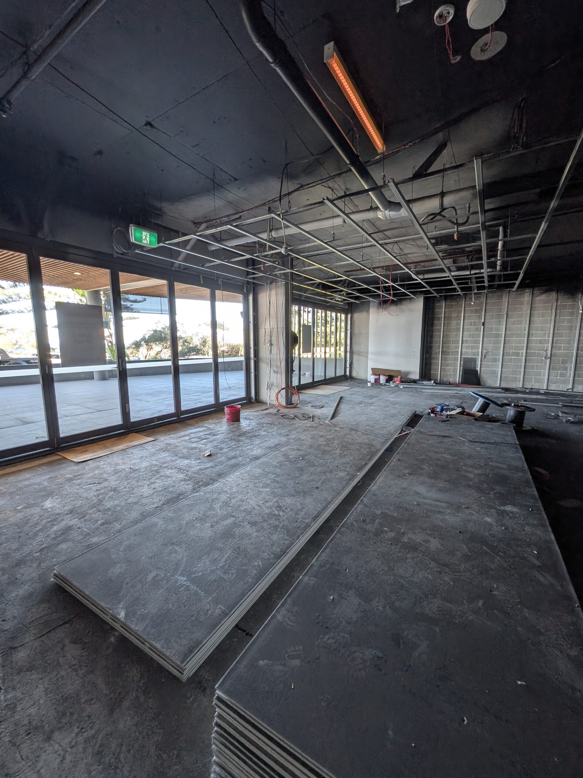 Commercial wall and floor tiling coordinated for a shop fit-out in the Shellharbour.