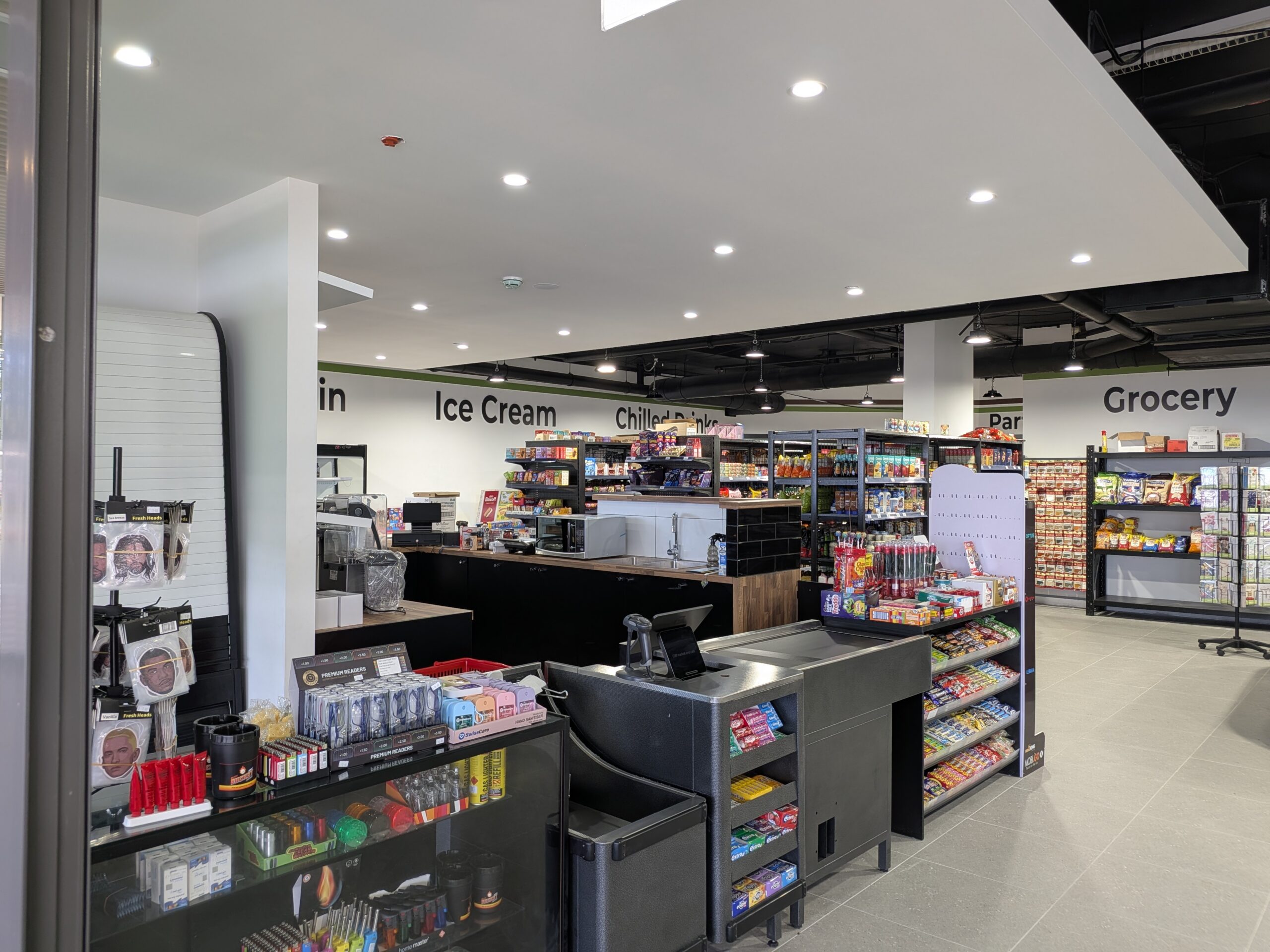Retail fit-out with custom counters, cabinetry and display shelving in Shellharbour.